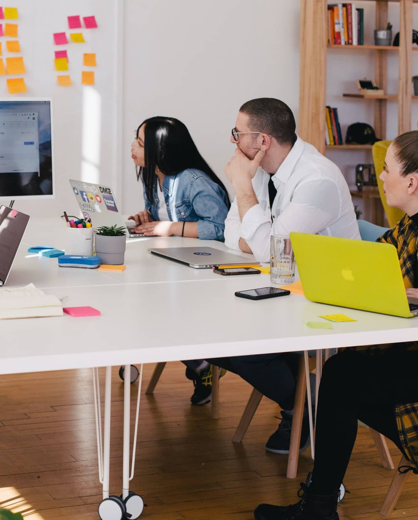 Team members going over a project together